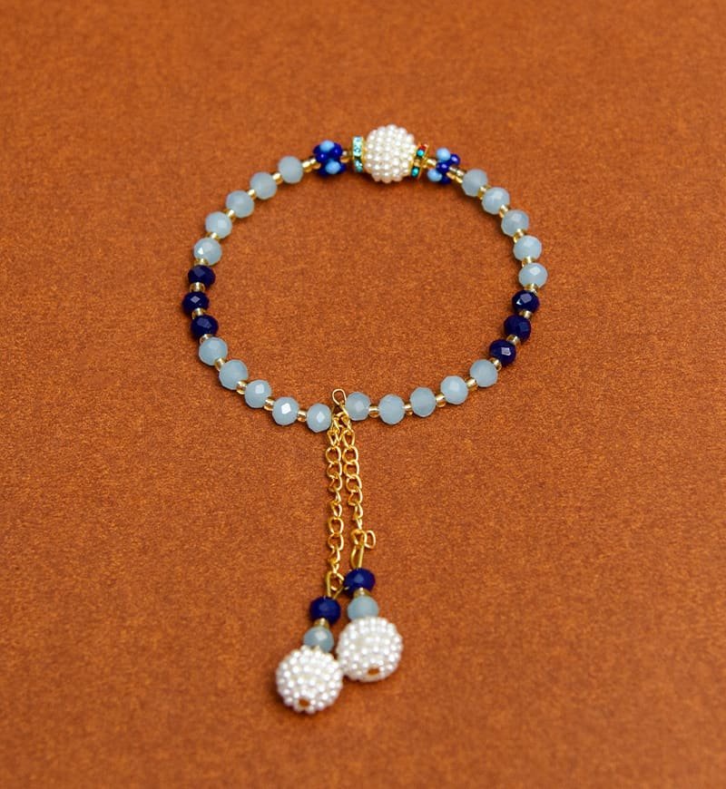 Blue and Aqua color Pearl Bracelet Rakhi For Women