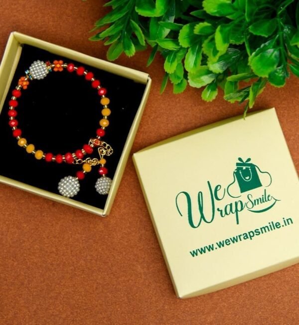 Red and Yellow Pearl Bracelet Rakhi For Women - Image 2