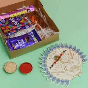 Divine Ganesh Rakhi & Choco Gems Hamper